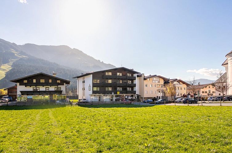 Enjoy the serene surroundings of Brixen Alpin Living Top 13, a vacation home in Brixen im Thale, surrounded by beautiful Tyrolean nature.