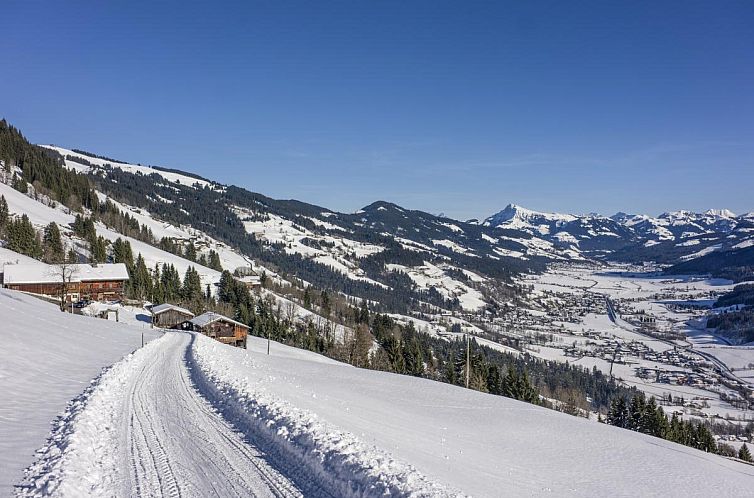 Discover the snowy beauty of Westendorf, Tyrol at vacation home Troadstadl XL with panoramic views.