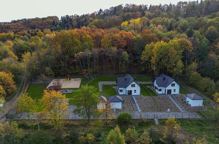 Ferienhaus in Marcyporeba, gelegen in einem malerischen Waldgebiet in Suedpolen.