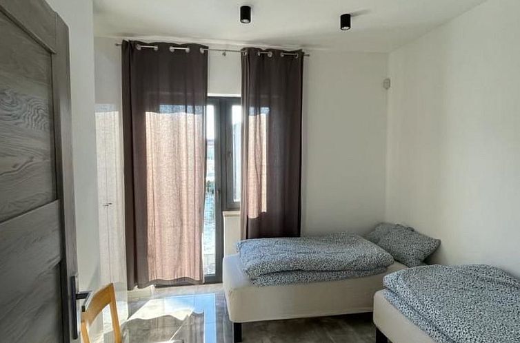 Appartement Adama mit Garten und Pool