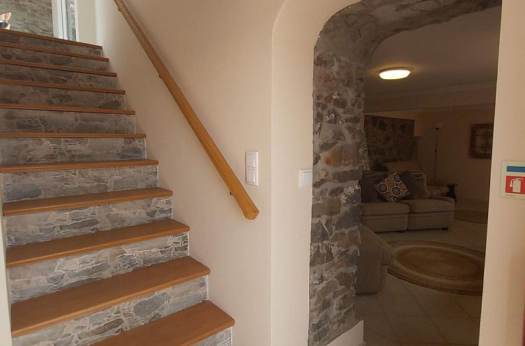 Vakantiehuis Cottage aus Stein mit Blick auf das Wasser