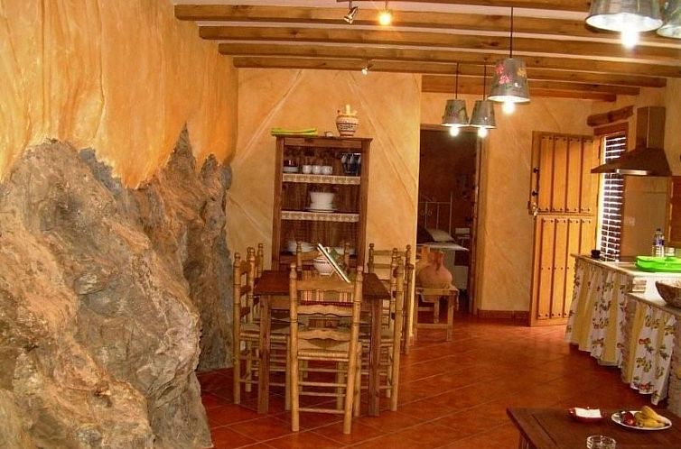 Vakantiehuis Haus mit integrierter Felswand und Jacuzzi