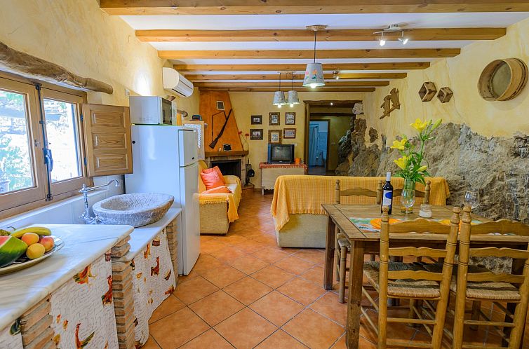 Vakantiehuis Haus mit integrierter Felswand und Jacuzzi