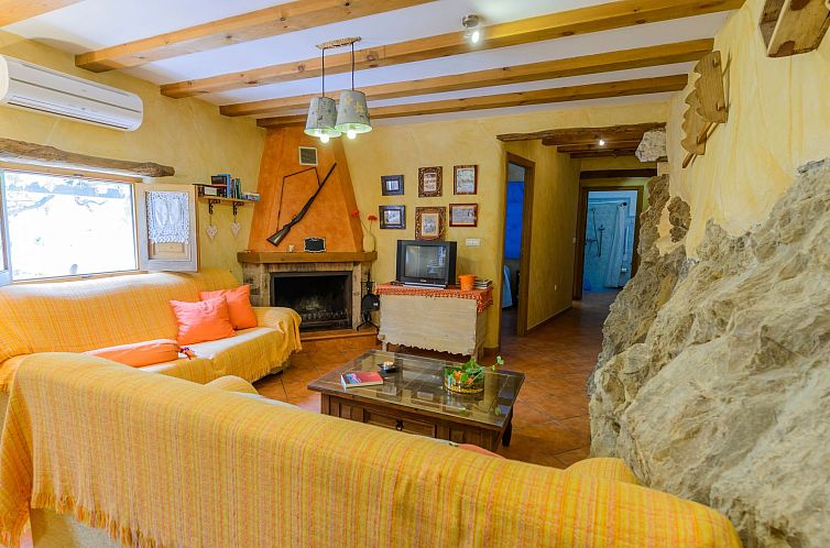Vakantiehuis Haus mit integrierter Felswand und Jacuzzi