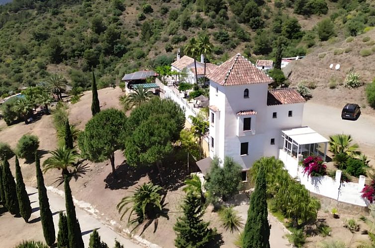 Charming vacation home in Tolox, Spain, with beautiful views of the hills of Andalusia.