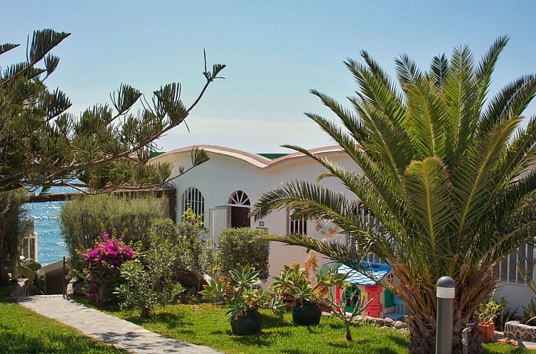 Appartement Bungalow auf einem Felsen direkt am Meer