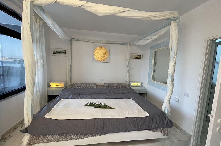 Vakantiehuis Eine romantische Villa direkt am Strand Sotaven