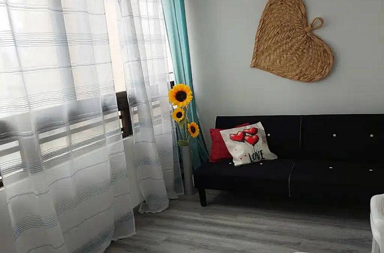 Modern appartement met zwembad en zeezicht