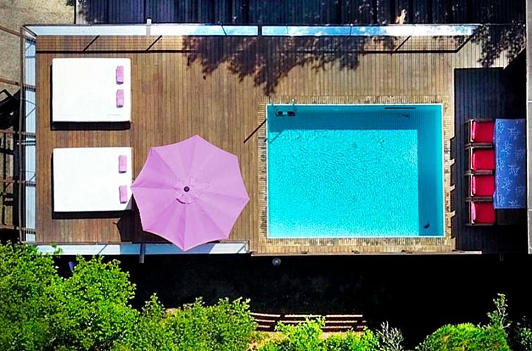 Relax on the terrace with pool at Casa Sa Fontansa, a vacation home in Begur, Costa Brava.