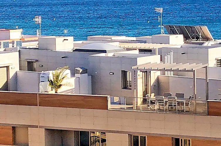 Penthouse aan strand met jacuzzi