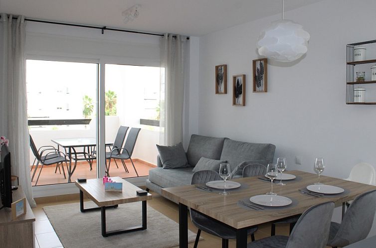 Interior of Sueno De Los Hermanos vacation rental in Roldan Torre Pacheco, Costa Calida, with modern furnishings and access to balcony.