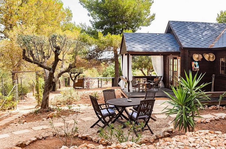 Ontspan op het terras van Vakantiehuis in Lliber, gelegen in de rustgevende omgeving van Costa de Valencia, Spanje.