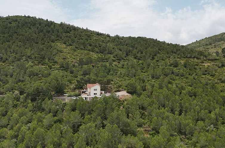 Geniet van de rust bij Vakantiehuis in Salem, verscholen in het groene landschap van Costa de Valencia, Spanje.
