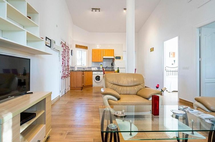 Appartement "Huelva" mit Gemeinschaftspool in einem andalusi