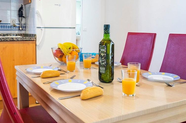 Appartement "Huelva" mit Gemeinschaftspool in einem andalusi