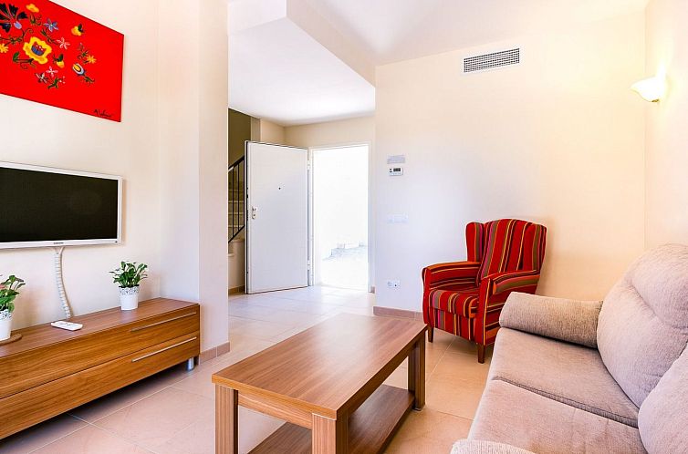 Vakantiehuis Mediterrane Doppelhaushälfte mit Garten