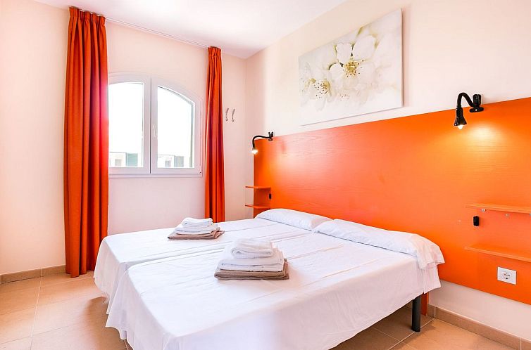 Vakantiehuis Mediterrane Doppelhaushälfte mit Garten