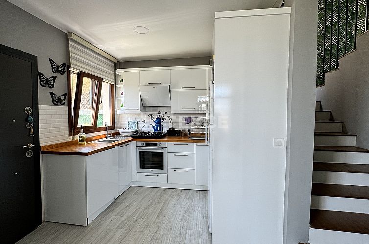 Geschakelde woning in Belevi