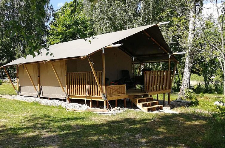 Stay in a safari tent in By Kyrkby, Svealand: Enjoy a unique glamping experience.