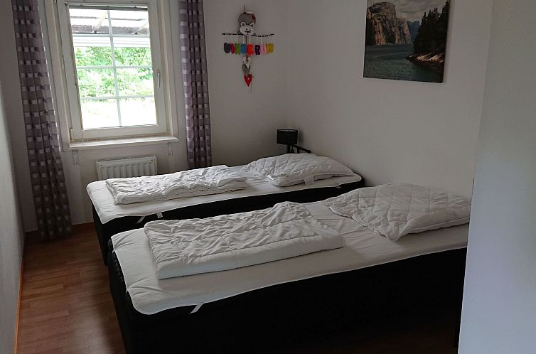 Vakantiehuis Familienfreundliches Ferienhaus mit großem Gar