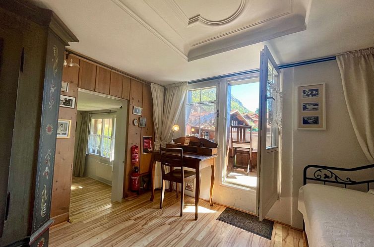 Vakantiehuis Chalet-Hausteil mit Garten im Dorfkern
