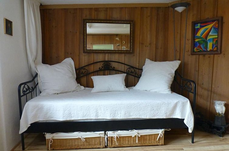 Vakantiehuis Chalet-Hausteil mit Garten im Dorfkern