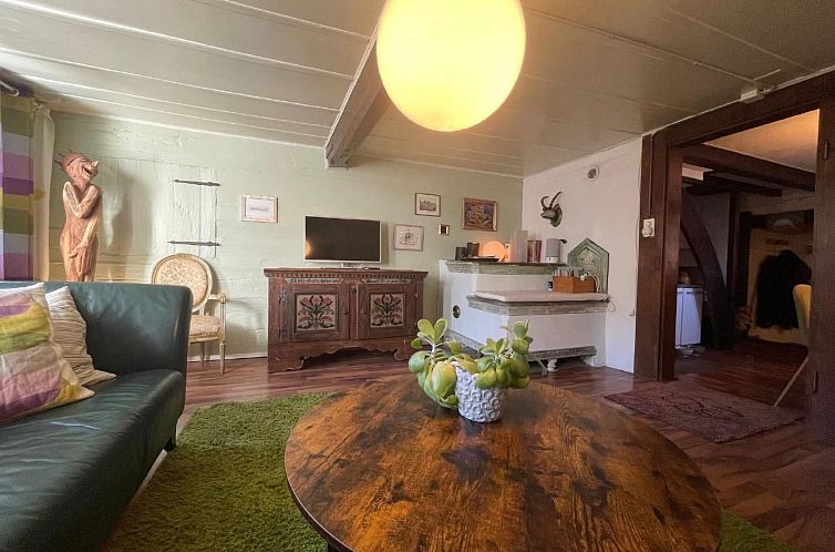 Vakantiehuis Chalet-Hausteil mit Garten im Dorfkern