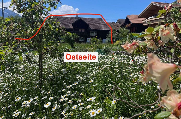 Vakantiehuis Chalet-Hausteil mit Garten im Dorfkern