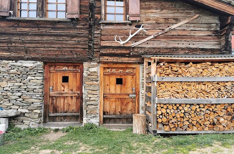 Vakantiehuis Alphütte Murmolta auf der Sonnenterrasse im Wa