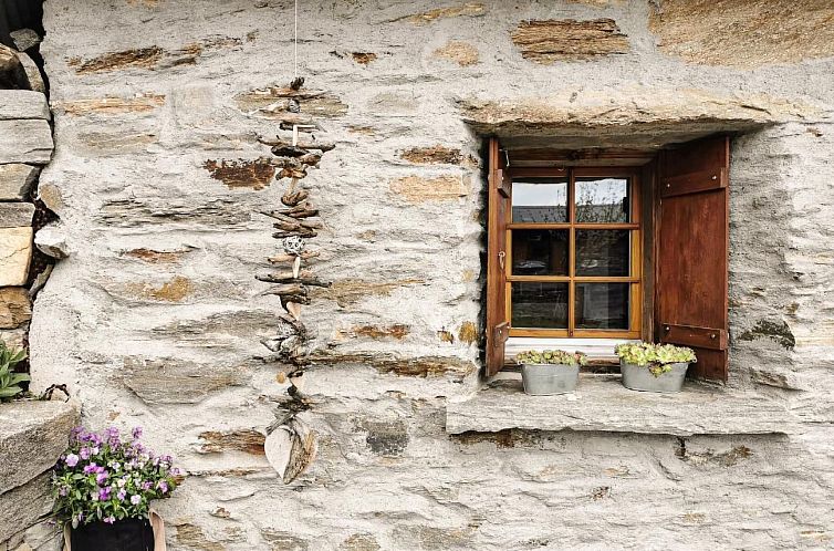 Vakantiehuis Alphütte Murmolta auf der Sonnenterrasse im Wa