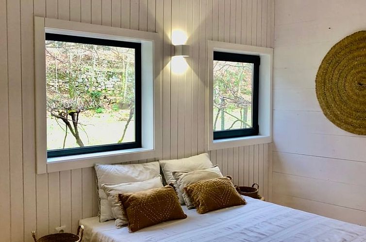 Lichte slaapkamer van vakantiehuis Huisje in Gondoriz, Arcos Valdevez, in het hart van Noord Portugal.