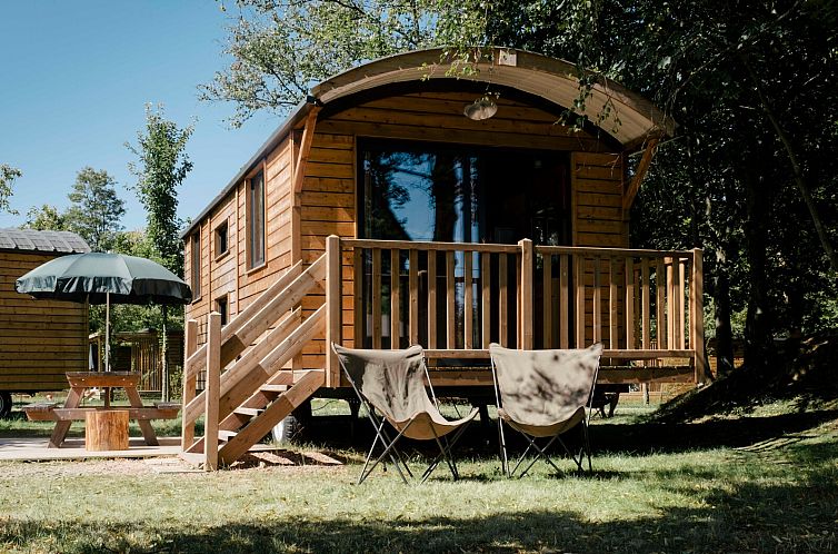 Charming Roulotte glamping lodge in Moyaux, surrounded by nature in Lower Normandy.