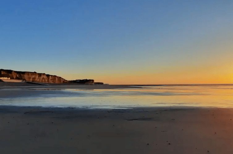 Enjoy the serene sunset from the beach at Holiday home in Saint-Aubin sur mer, Lower Normandy, France.