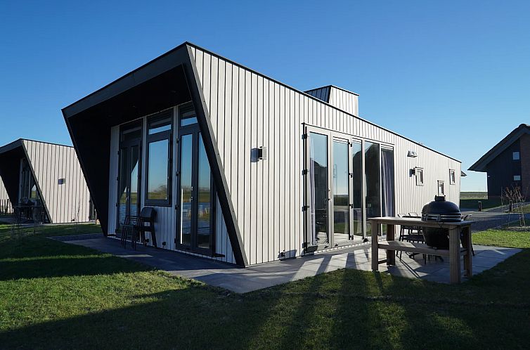 Modern exterior of Chalet in Hindeloopen, vacation home in Frisian Eleven Cities, Friesland.