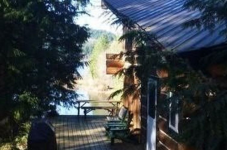 Vakantiehuis Lakeside Real Log Cabin mit privatem Dock, Haus