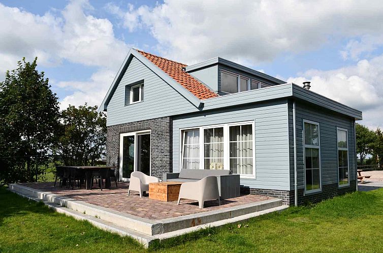 FR125 vacation home with terrace in Oldetrijne, Friesland, amidst the Frisian countryside.