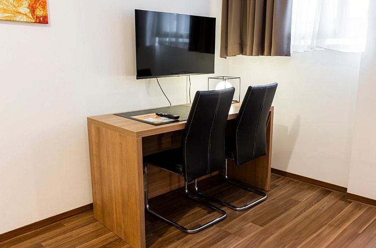 Orange Hotel und Apartments