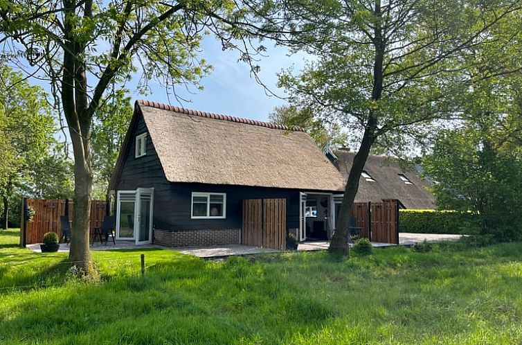 Gezellig vakantiehuisje in Noordwijk, Zuidwest Groningen, omringd door groen, ideaal voor een ontspannen verblijf.