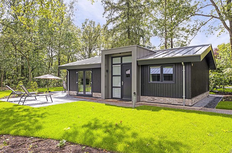 Heidezicht vacation home in Lage Mierde with modern look and green surroundings in the Kempen, North Brabant.