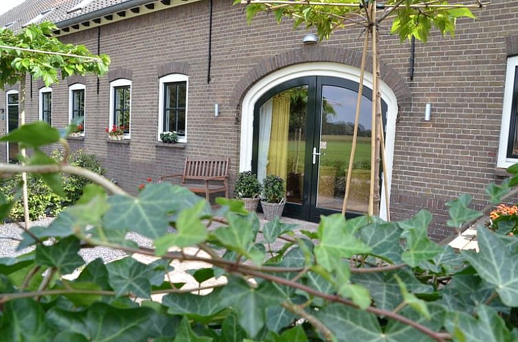 Charmant vakantiehuis in Baarle-Nassau met landelijke gevel in de Kempen, Noord Brabant.