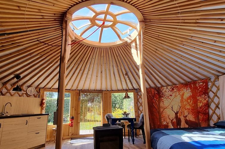 Gezellige binnenruimte van Vakantiehuisje in Liempde, Noord Brabant met natuurlijk licht en houten interieur.