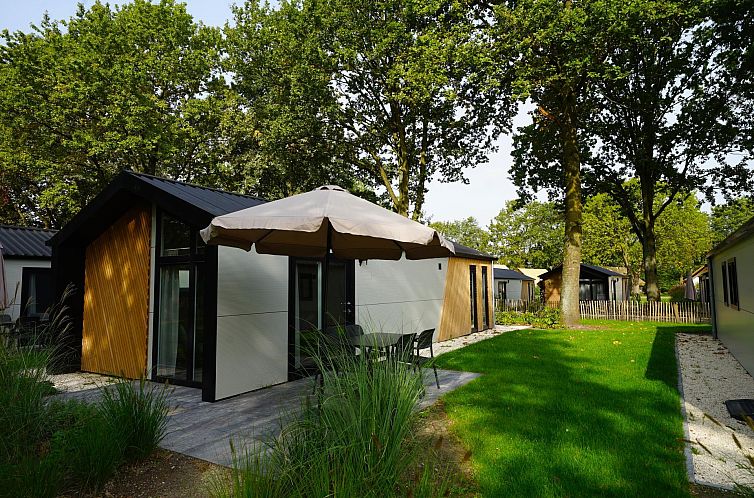 Kids Adventure cottage 2+2 in Kaatsheuvel offers a serene outdoor space with terrace, ideal for a relaxing vacation in Hart van Brabant.