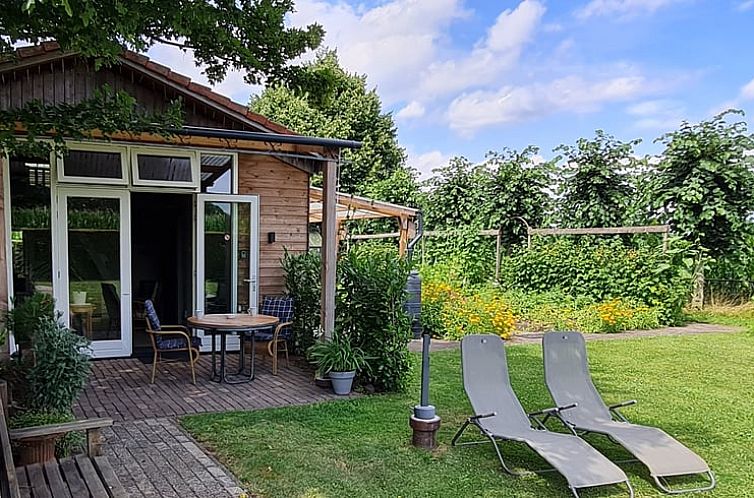 Enjoy the green garden at Holiday Home in Tilburg, North Brabant.