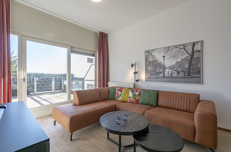 Gezellige woonkamer in Wijde Blick 103 Callantsoog, vakantiehuis aan de Noordzeekust, Noord-Holland.