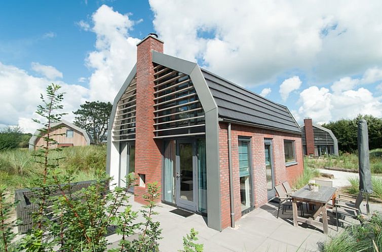 Vacation home in Egmond aan den Hoef with modern veranda, located on the North Sea coast in North Holland.