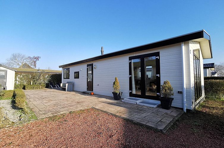 Chalet Basic 5 persons in Egmond aan den Hoef, North Sea coast North Holland with sunny terrace and spacious garden for relaxation.