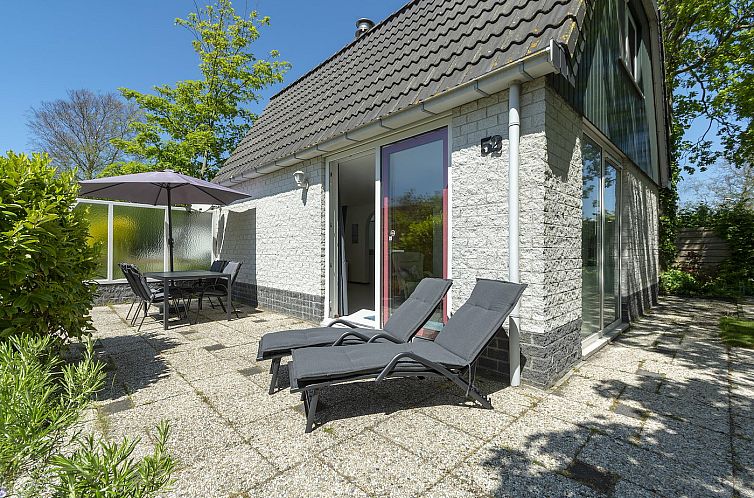 Sunny terrace at Campanula 52 Sint Maartenszee vacation home in North Holland