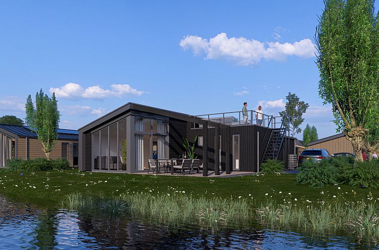 Cube Split 6+2 vakantiehuis in Enkhuizen, Noord-Holland met moderne veranda en uitzicht op de natuurlijke omgeving aan de IJsselmeerkust.