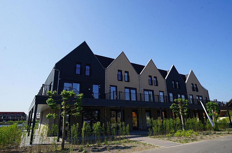 Ferienhaus De Scheepswerf 4 in Kampen, Overijssel, mit moderner Architektur und grosser Terrasse in ruhiger Umgebung.