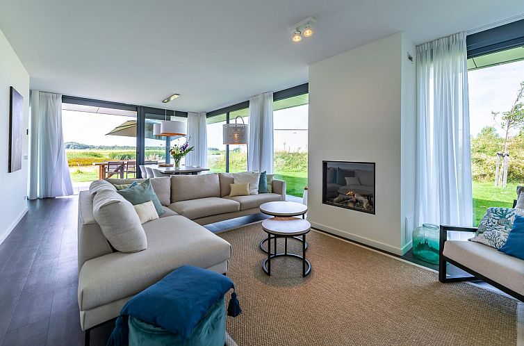 Cozy living room in Waterline 42 | De Groote Duynen, Kamperland, vacation home overlooking nature in North Beveland, Zeeland.